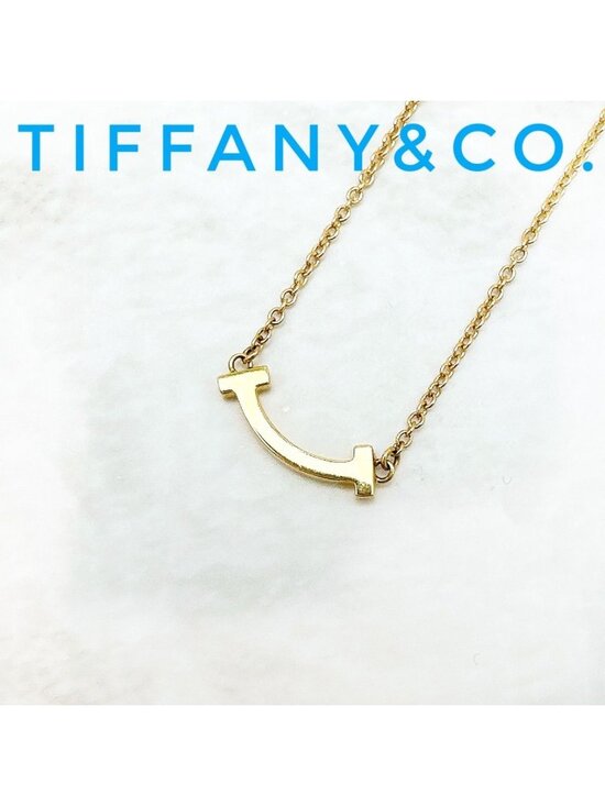 Tiffany & Co. Jewelry - Tiffany & Co T Smile Mini Yellow Gold Necklace
